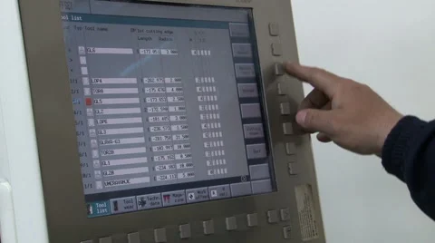 Worker control cnc machine, typing on the monitor and keyboard, set the function Video stock 49070519