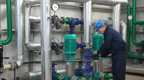 Worker control devices in a Heating Plant Stock Footage 24651594