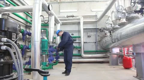 Worker control devices in a Heating Plant Stock Footage 24651810