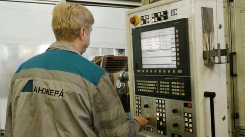 Worker at the control panel at a machine-building plant Stock Footage 101683209