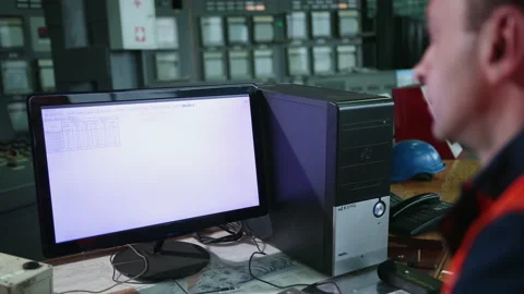 Worker in control room. Heavy industry engineer stand in manufacturing factory 動画素材 145814588