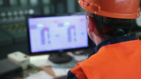 Worker in control room. Heavy industry engineer stand in manufacturing factory Stock Footage 145996655