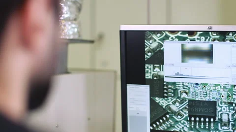 Worker controlling quality of PCB boards Stock Footage 50304770