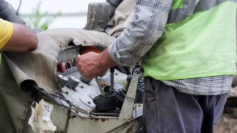 Worker Controls Construction Machinery with Joysticks Close-Up Stock Footage 292521032