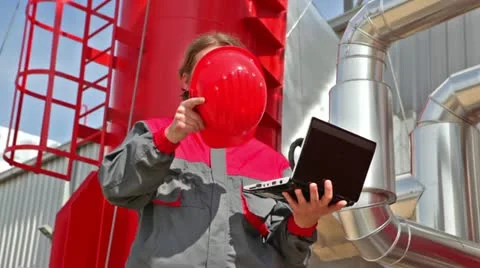 Worker controls devices in a Heating Plant Stock Footage 24672705