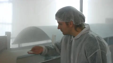 Worker controls quality of sugar in a Factory Stock Footage 10472853