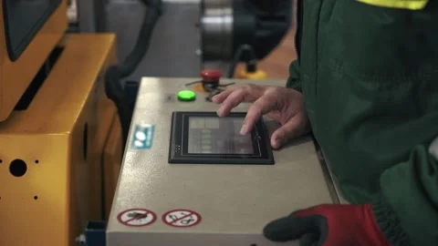 Worker  controls remote control metal steel sheet rolling cutting machine Video stock 265412858