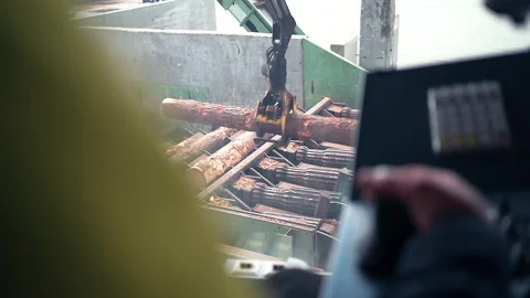 Worker Controls The Robot And The Conveyor Of The Woodworking Plant Stock Footage 142711859