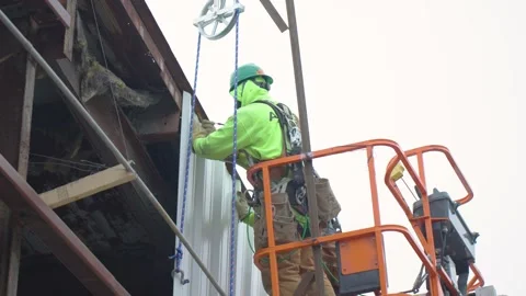 Worker on Crane Lift Stock Footage 238859076