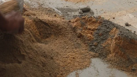 Worker creating the cemented mixture. using cement powder Stock Footage 245101573