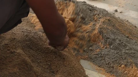 Worker creating the cemented mixture. using cement powder Stock Footage 245101921