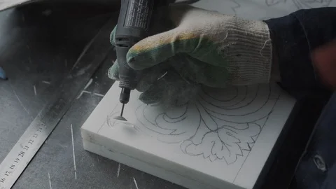 Worker creating a pattern for a marble fireplace, deep cutting the first layer o 스톡 동영상 99039473