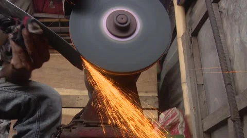 Worker Creating Sparks While Grinding Metal Stock Footage 319958647