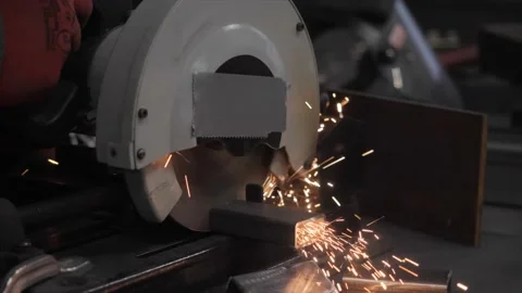 The worker cut the metal with circular saw 스톡 동영상 228774872