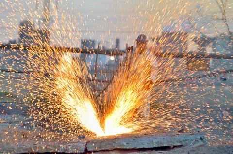 Worker cut metal using blowtorch Stock Photos