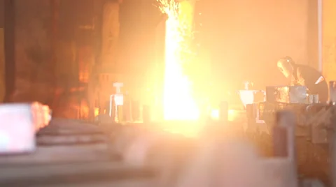 Worker cuts fiery steel blocks Stock Footage 47891729