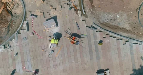 A worker cuts a granite slab with a grinder. Working process at a construction Stock Footage 301228381