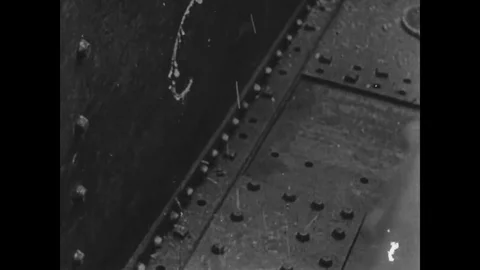 Worker cuts heavy steel with the help of a flame cutter - 1917-1918 Stock Footage 83686994