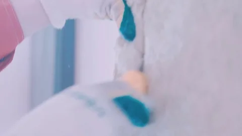 Worker cuts the insulator Stock Footage 77350369