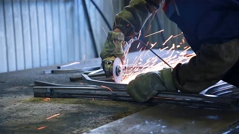 Worker cuts metal Stock Footage 97730811