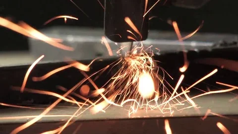 A worker cuts a metal part with a cutting wheel, vulcanite, sparks fly, iron sca Stock Footage 80940769