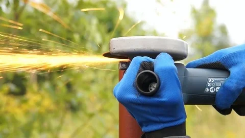 Worker cuts a metal pipe Stock Footage 80051531