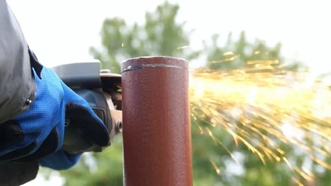 Worker cuts a metal pipe Stock Footage 80051541