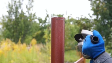 Worker cuts a metal pipe Stock Footage 80088904