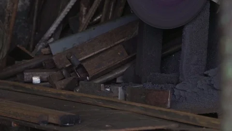 The worker cuts metal pipe with a grinder close-up Video stock 104262934