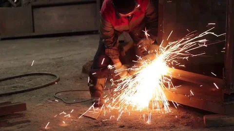 Worker cuts metal sheets abrasive tool Stock Footage 71184602