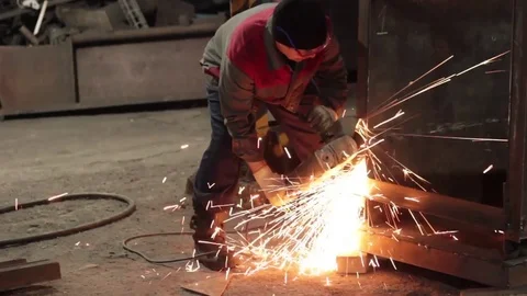Worker cuts metal sheets abrasive tool Stock Footage 71184732