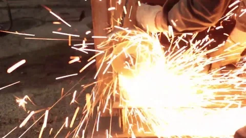 Worker cuts metal sheets abrasive tool Stock Footage 71184810