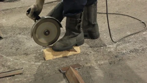 Worker cuts metal sheets abrasive tool Stock Footage 71185003
