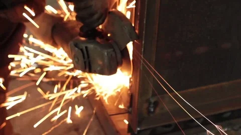 Worker cuts metal sheets abrasive tool Stock Footage 71185018