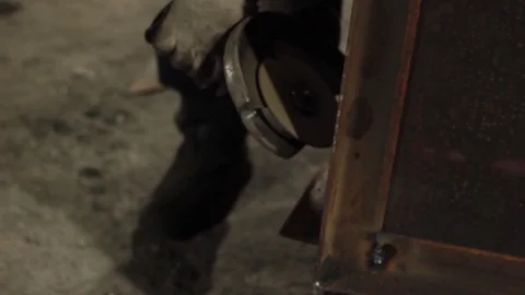 Worker cuts metal sheets abrasive tool Stock Footage 71185084