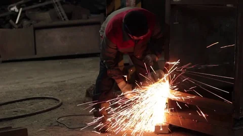 Worker cuts metal sheets abrasive tool Stock Footage 71185126