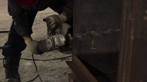 Worker cuts metal sheets abrasive tool Stock Footage 71185283