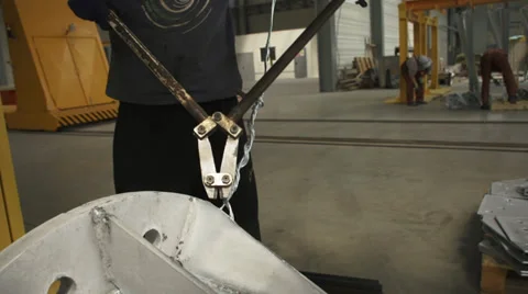 Worker cuts metal wire Stock Footage 34828156