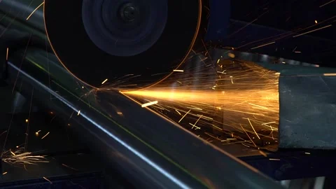 Worker cuts the pipe with a metal cutter disk. Large sparks from metalworking 스톡 동영상 237802857