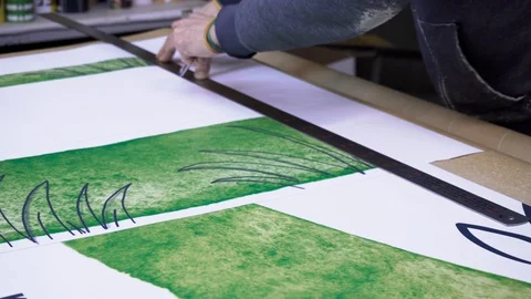 Worker cuts to ruler 库存影片 128396679