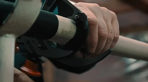 Worker cuts thick cable with a special tool Stock Footage 47369317