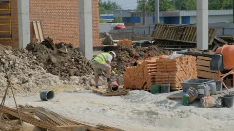 A worker cuts a water pipe Video stock 279816874