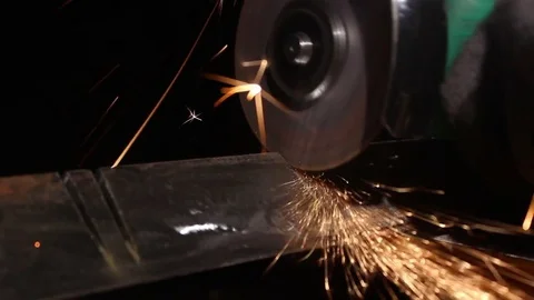 Worker cutting with angle grinder machine Stock Footage 70618438