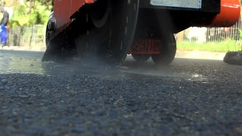Worker cutting asphalt road, close up Stock Footage 89570418