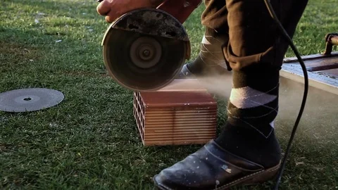 Worker cutting the brick Stock Footage 75770009