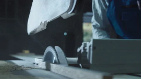 Worker cutting detail in shop Stock Footage 100543348