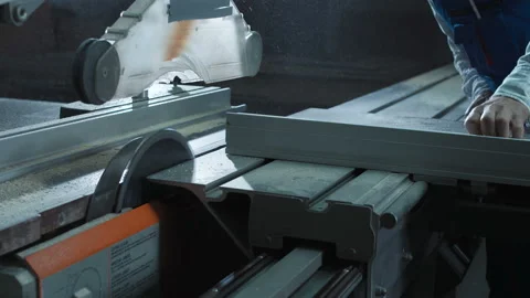 Worker cutting detail in shop Stock Footage 100548531