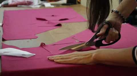 Worker cutting fabric 3 Stock Footage 33458368