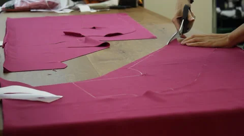 Worker cutting fabric 4 Stock Footage 33459254