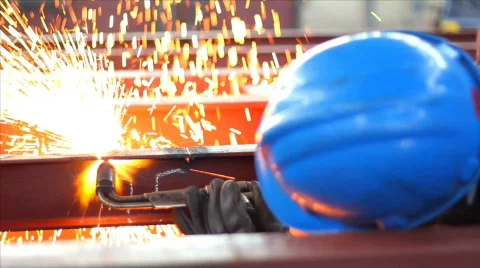 Worker cutting metal with a flame Stock Footage